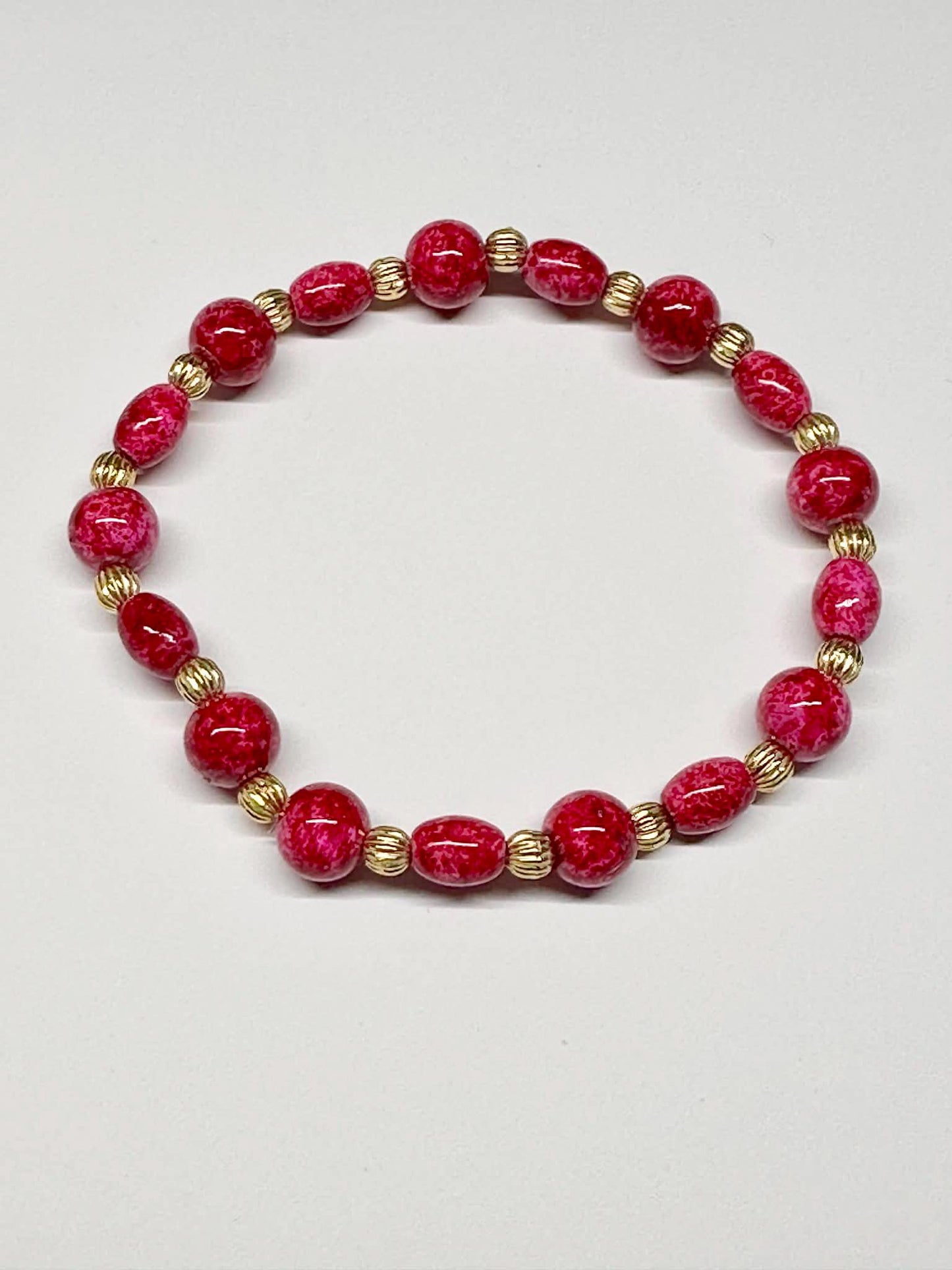 Single Strand Reddish Pink Mixture Beaded Stretch Bracelet