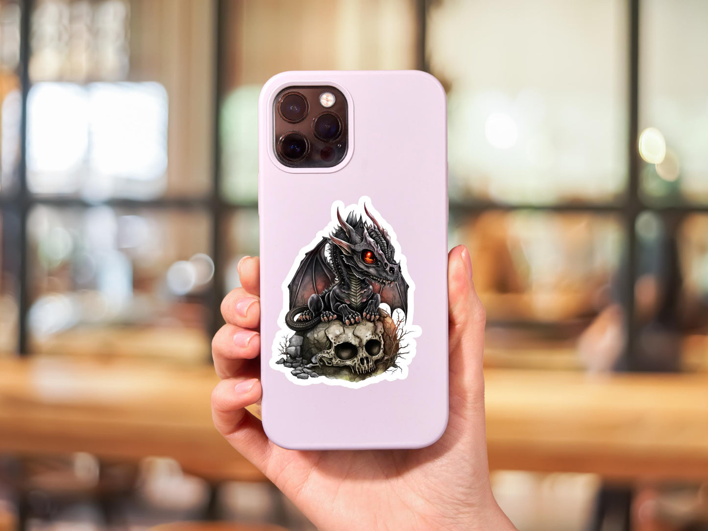 Fantasy Black Dragon Sitting On A Skull With Rocks Sticker